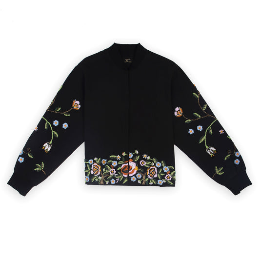 Front view of the beaded Charlie Denim Unisex Jacket Some examples of alt text are “Black
denim jacket (unisex) has beaded embellishments on sleeves” and “Charlie denim jacket in black
with intricate bead detailing.”