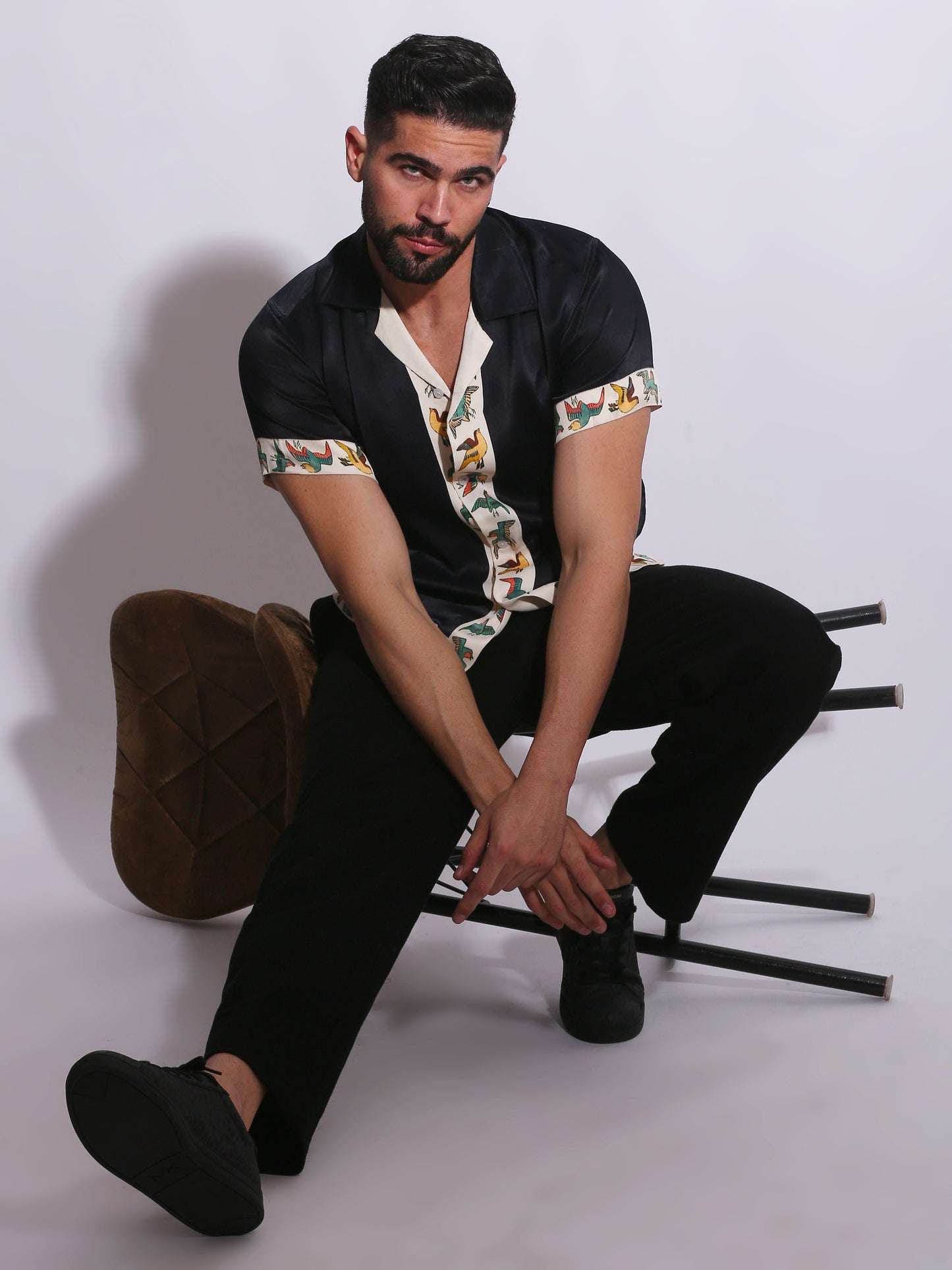 this shirt transitions effortlessly from relaxed daytime wear to more refined evening settings—delivering a confident, statement presence.