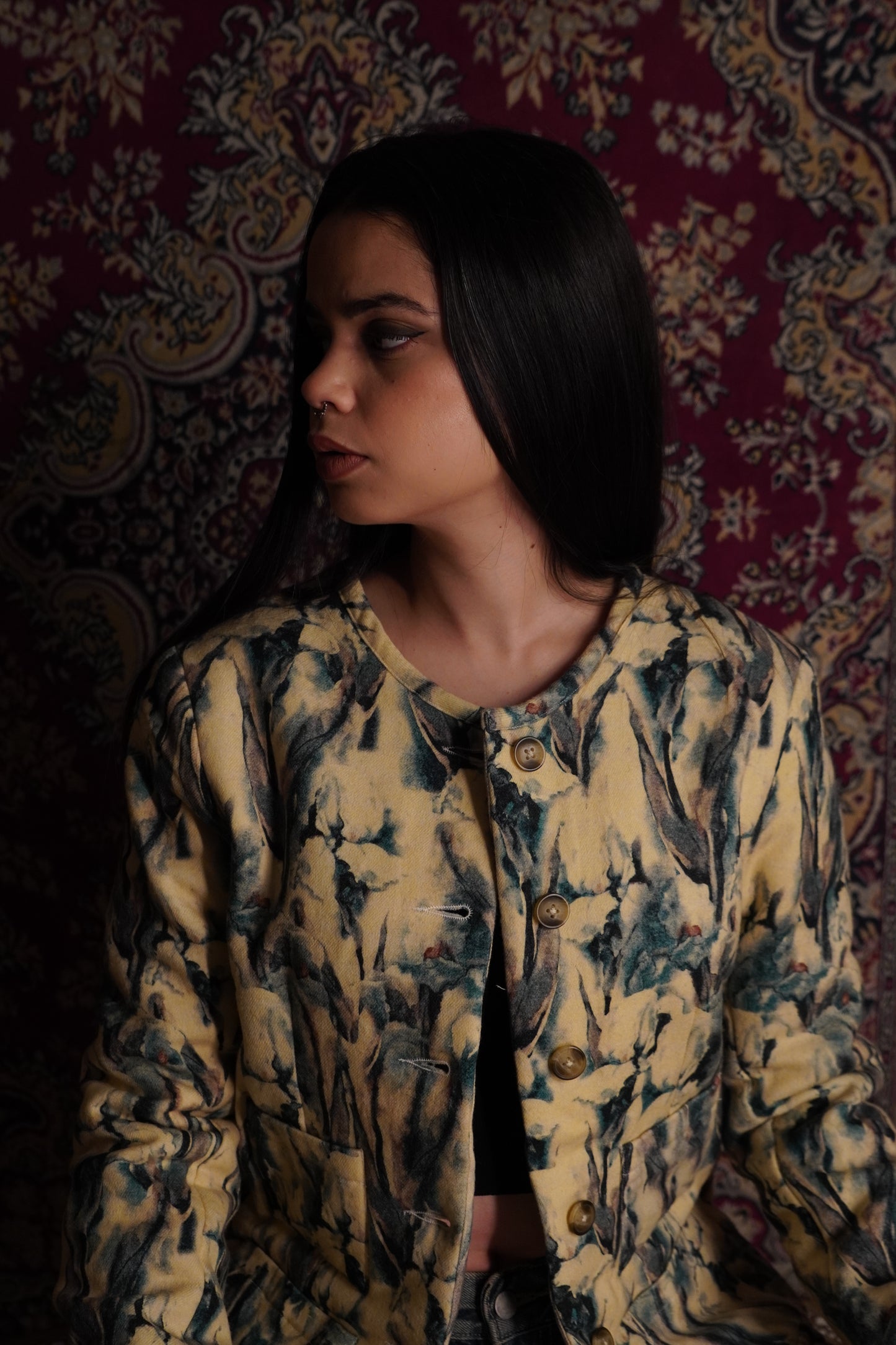This piece of clothing has been referred to on the Bee as the “Noor women’s
multicolored fleece wool quilted jacket with warm quilting.” A fashionable fleece quilted
wool coat in a shocking colorful panels for women