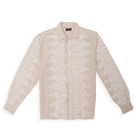 A beige linen shirt with intricate corded embroidery spread across the surface.