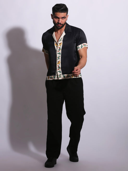 The BIRD OF PARADISE SHIRT is designed to bring a sense of movement and individuality through carefully placed print detailing.
