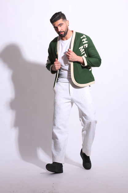 Man holding a guitar case on a white background