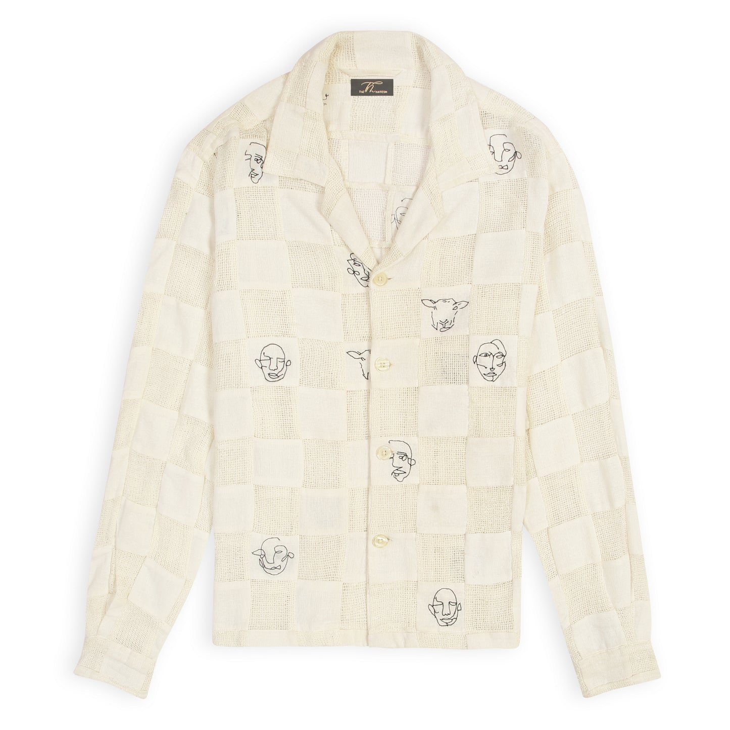 An off-white patchwork shirt with artistic face doodles on a casual collar and sleeve design.