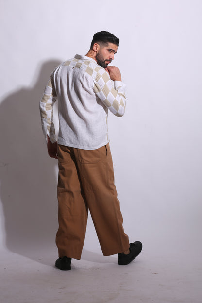 Men's neutral-toned checkerboard patchwork linen shirt with a classic collar.