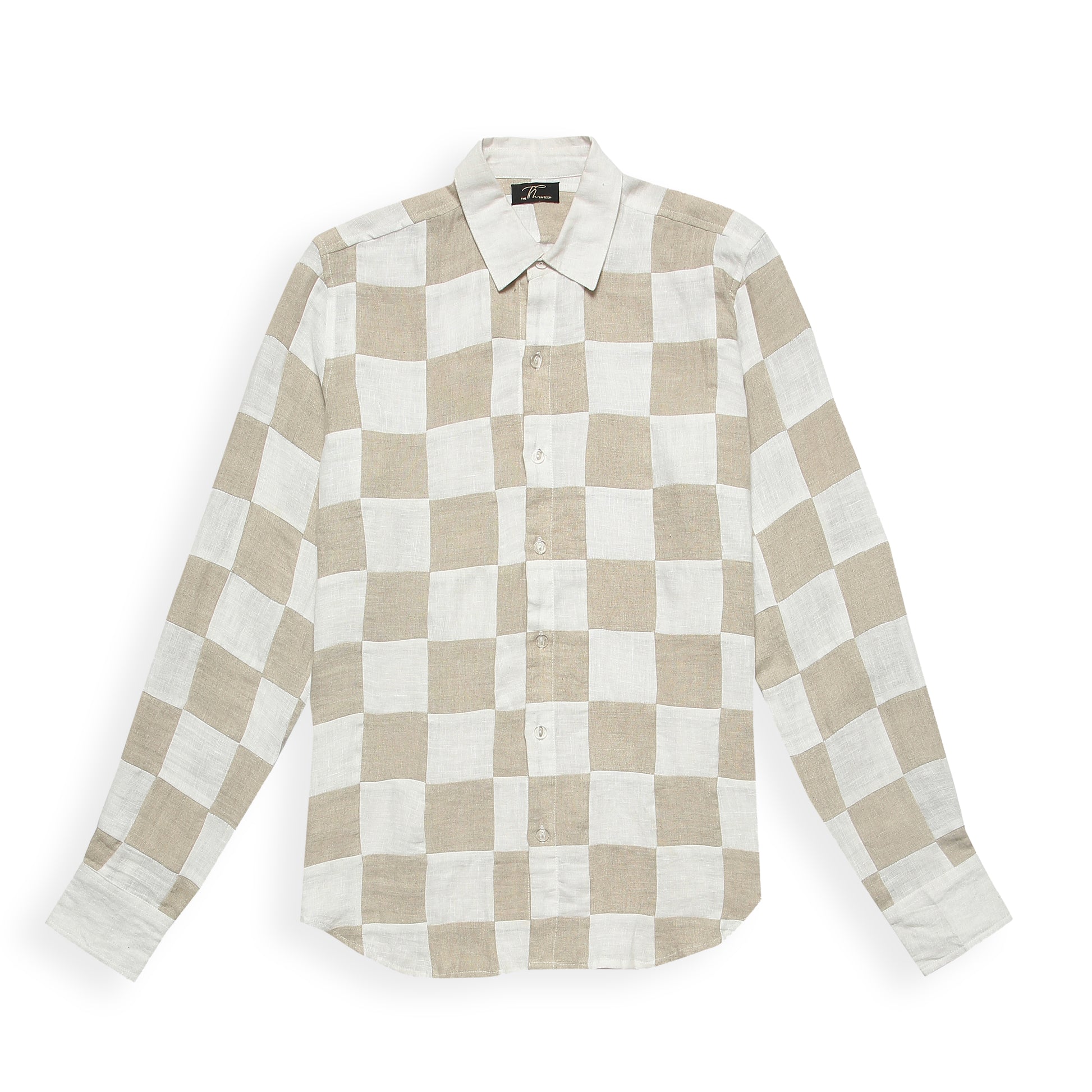 A long sleeve linen shirt featuring a checkerboard patchwork design in beige and white colors.