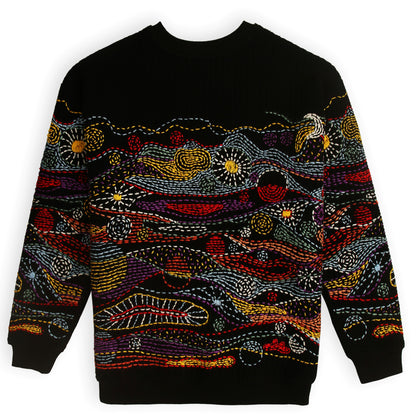 Black sweater with colorful abstract pattern on a white background