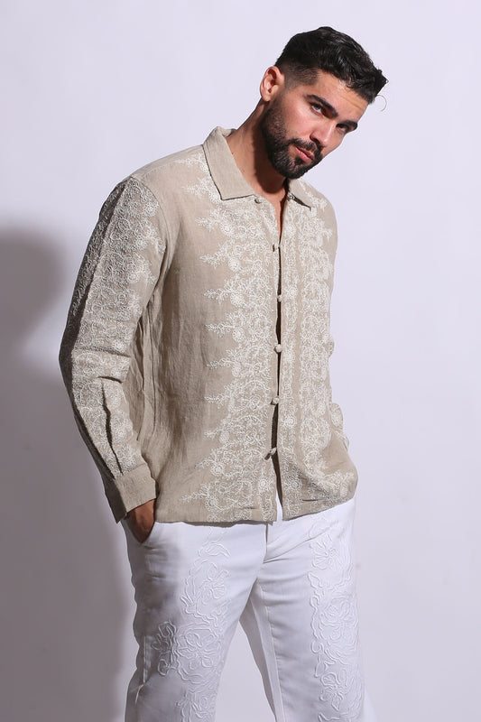 Textured beige linen shirt with traditional Chinese-style knotted buttons and a relaxed, sophisticated fit.