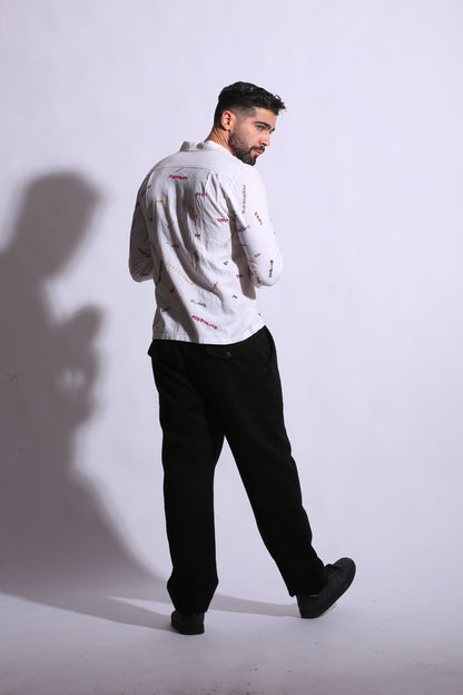 “Premium white linen shirt with embroidered details”