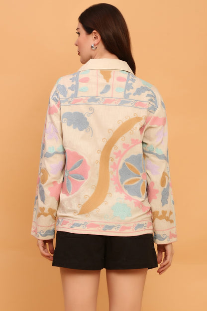 “All-over Suzani embroidery and chain stitches on a unisex organic cotton shirt” 