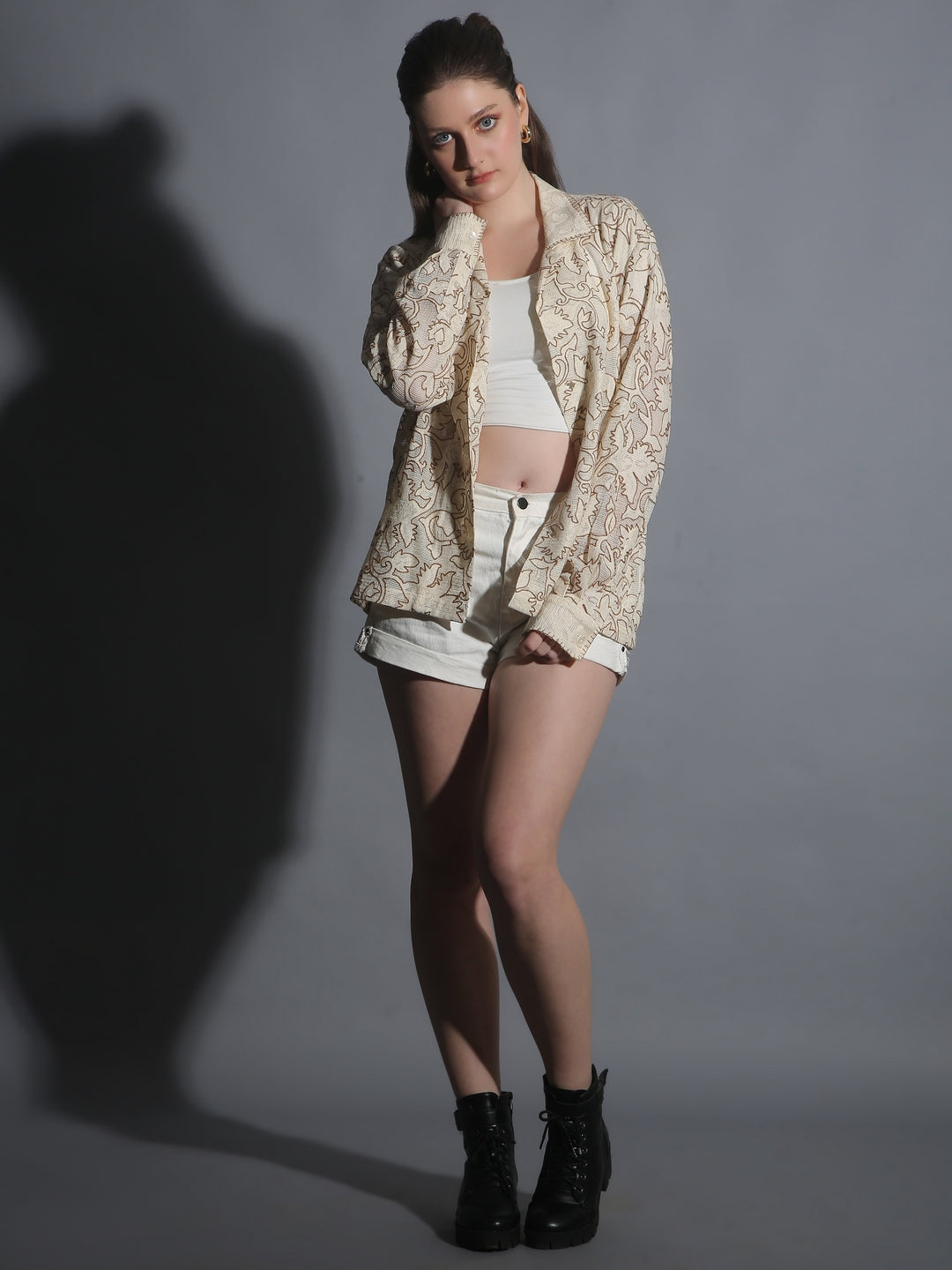 “Beige embroidered textured weave shirt with intricate chain stitch work” 