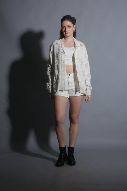 “Artistic face pattern on patchwork cotton shirt in beige 